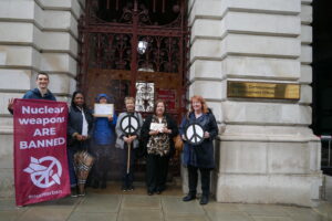 CND and Medact members stand outside the UK Foreign and Commonwealth Office