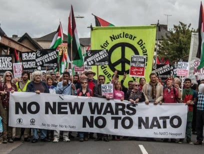 CND banner among front of protest. Banner at the front reads: "No New Wars - No To NATO"