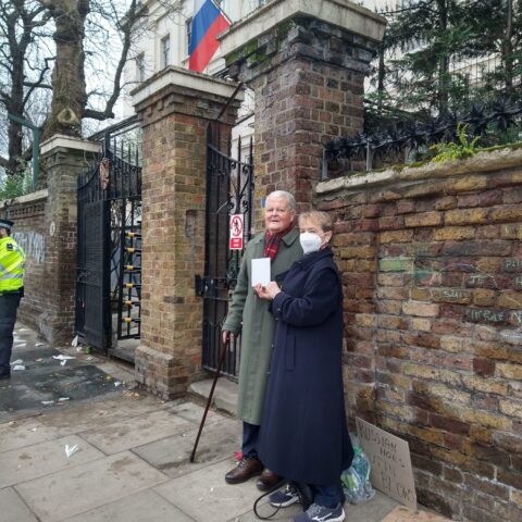 CND Vice-President Bruce Kent and CND General Secretary Kate Hudson stand outside the Russian Embassy with letter for the Ambassador