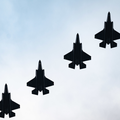 Four F-35 aircraft fly overhead at RAF Lackenheath