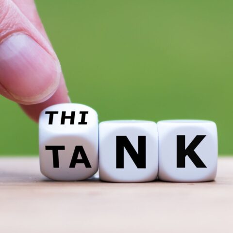 Dice that spell out the word "think tank"